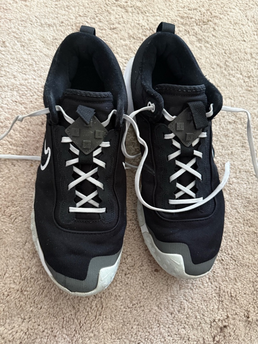 Nike Black Athletic Sneakers with White Laces and Gray Accents